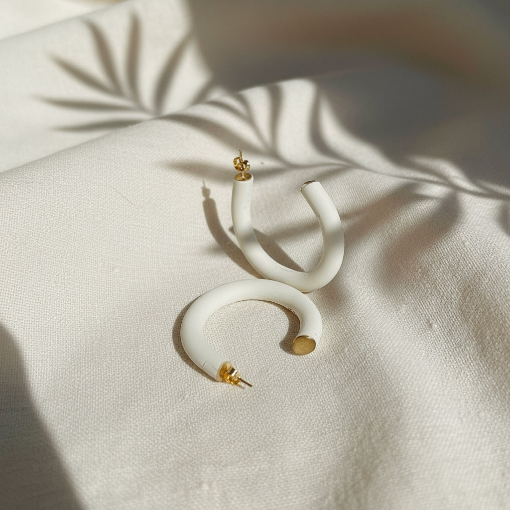 Earthy Hoops - Handcrafted polymer clay earrings that blend style and comfort. These lightweight hoops offer natural elegance and are perfect for any outfit.