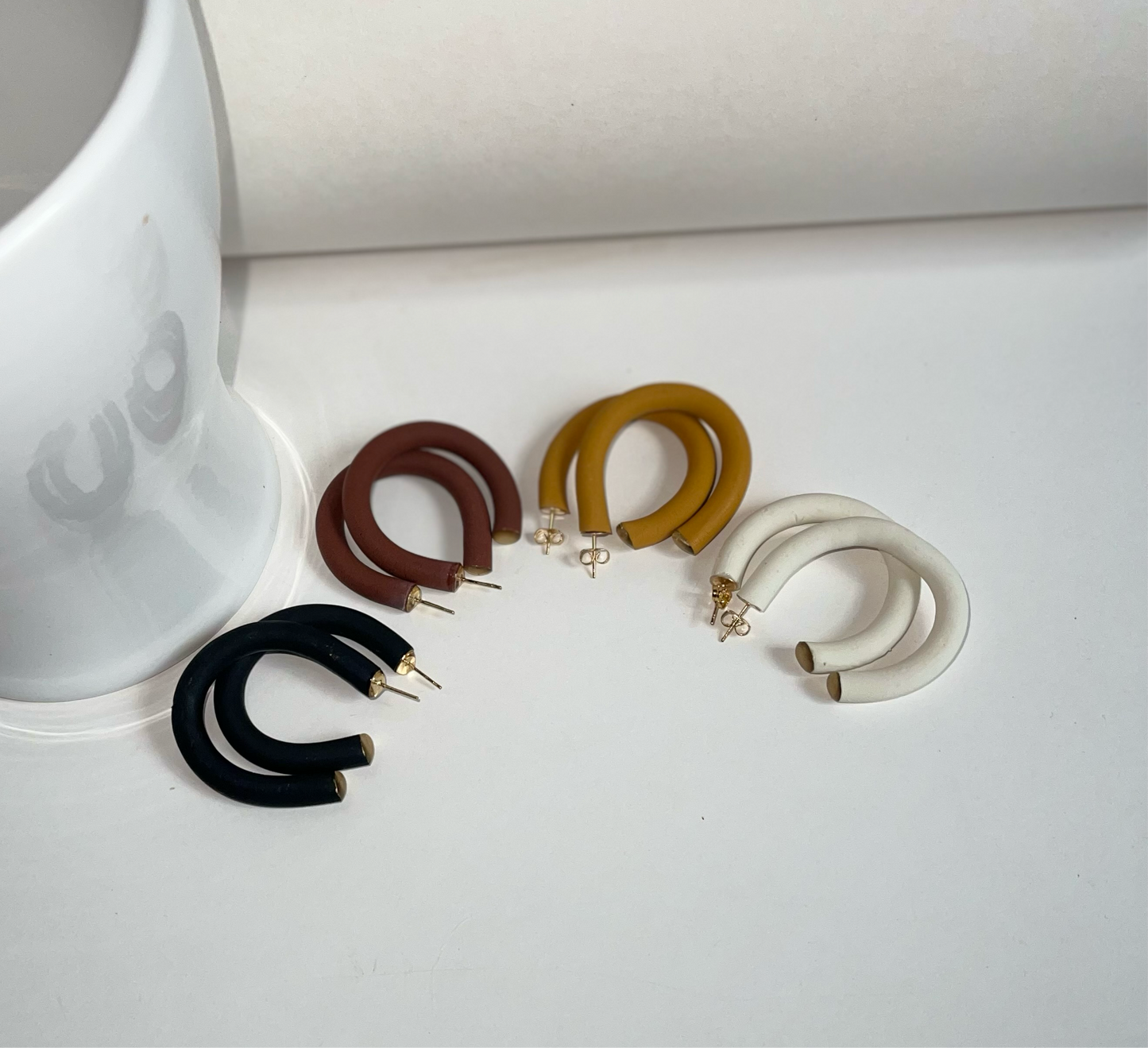 Earthy Hoops - Handcrafted polymer clay earrings that blend style and comfort. These lightweight hoops offer natural elegance and are perfect for any outfit.