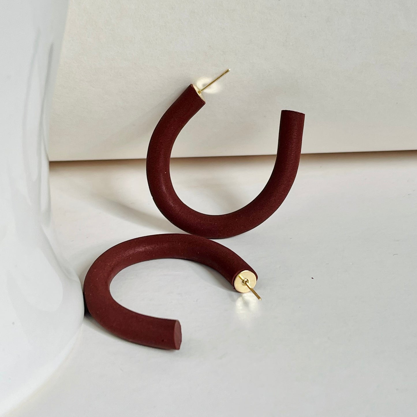 Earthy Hoops - Handcrafted polymer clay earrings that blend style and comfort. These lightweight hoops offer natural elegance and are perfect for any outfit.