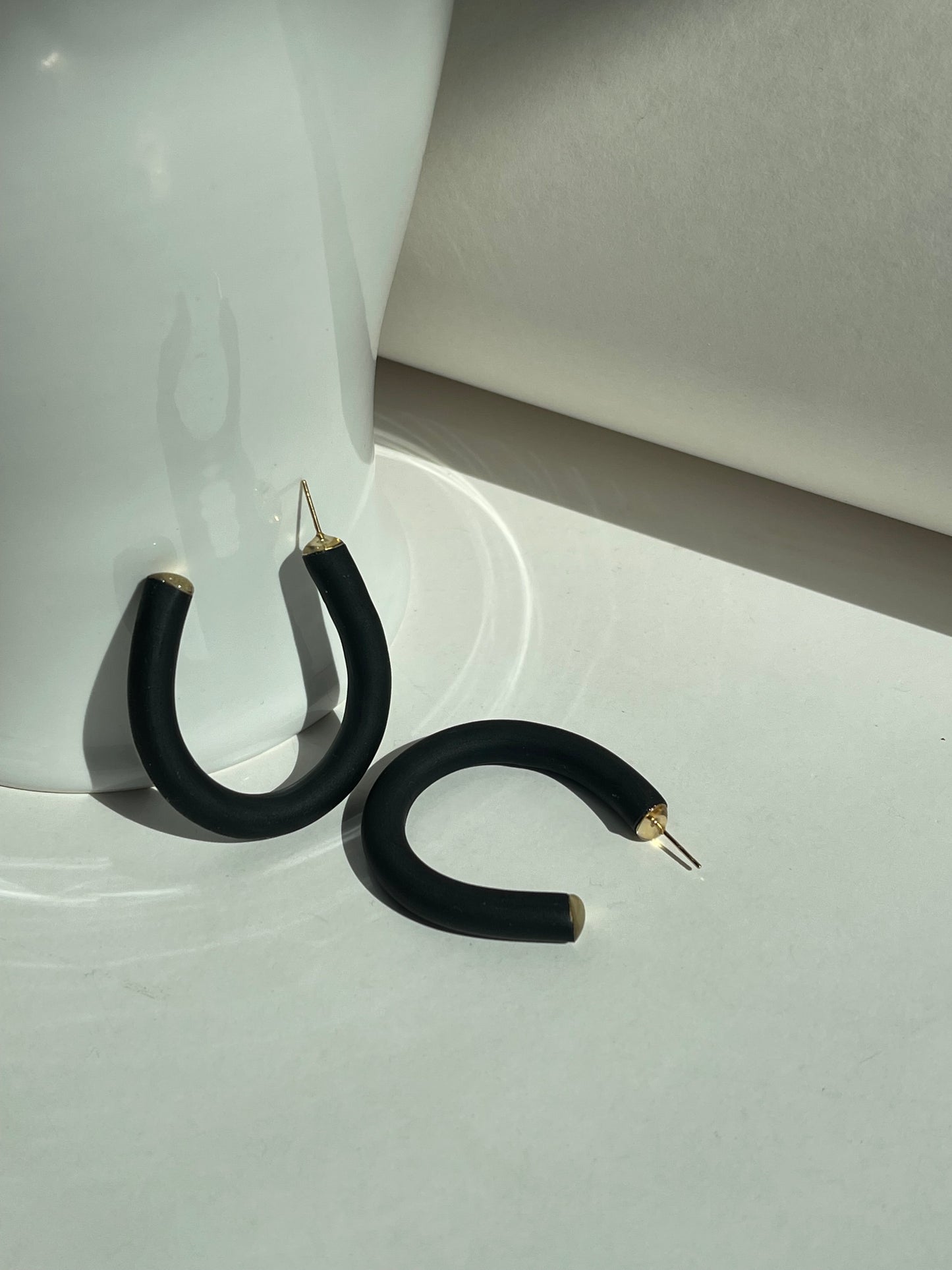 Earthy Hoops - Handcrafted polymer clay earrings that blend style and comfort. These lightweight hoops offer natural elegance and are perfect for any outfit.