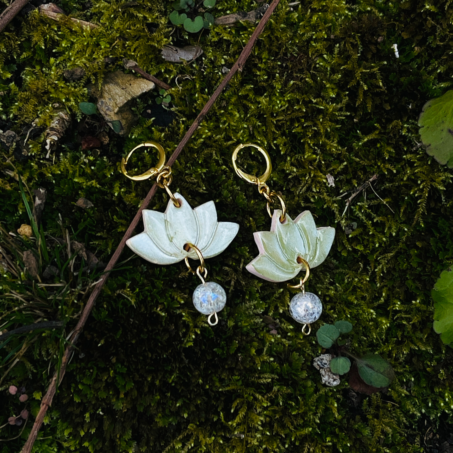 Green handcrafted Lotus Flower Earrings made from lightweight polymer clay, symbolizing purity and resilience. Unique, lead and nickel-free jewelry, perfect for sensitive ears.