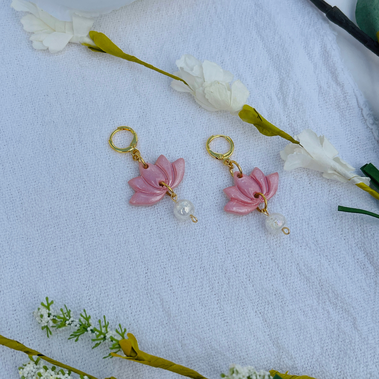 Handcrafted Pink Lotus Flower Earrings made from lightweight polymer clay, symbolizing purity and resilience. Unique, lead and nickel-free jewelry, perfect for sensitive ears.