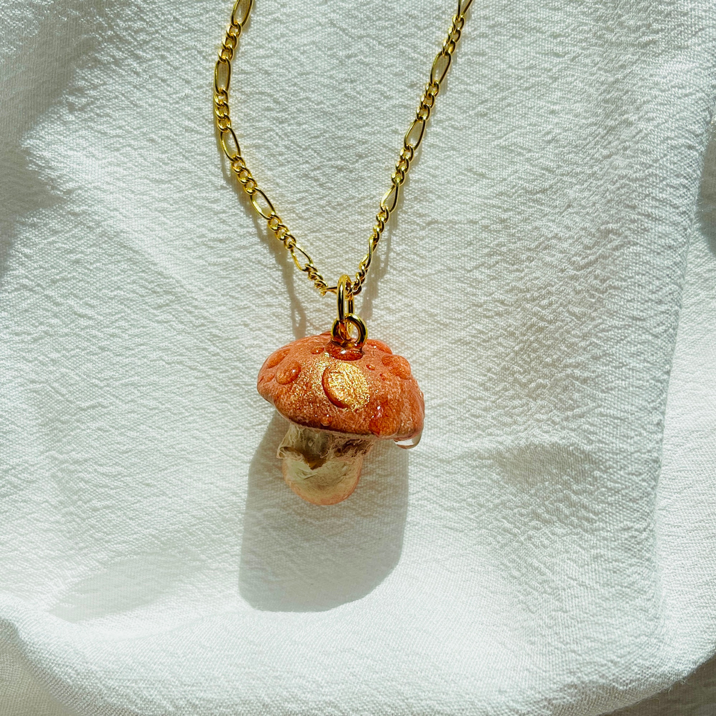 Handcrafted Woodland Mushroom Necklace made from polymer clay, featuring intricate details and a whimsical design, perfect for adding a touch of nature-inspired charm to any outfit.