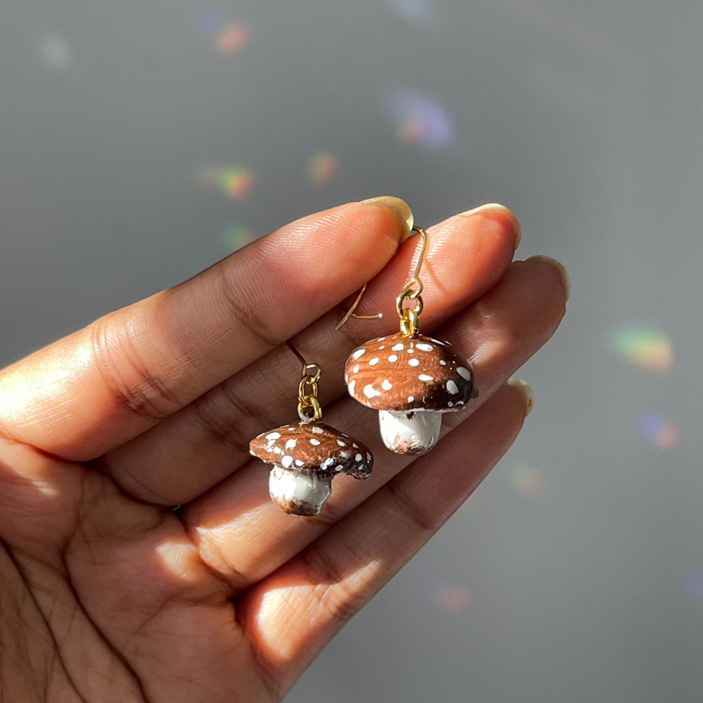 Handcrafted polymer clay earrings featuring intricate details, perfect for adding whimsical charm to any outfit. Lightweight and comfortable for all-day wear.