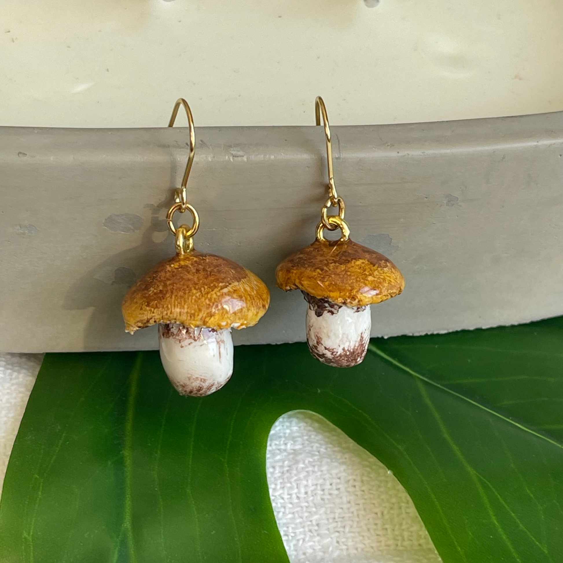 Handcrafted polymer clay earrings featuring intricate details, perfect for adding whimsical charm to any outfit. Lightweight and comfortable for all-day wear.