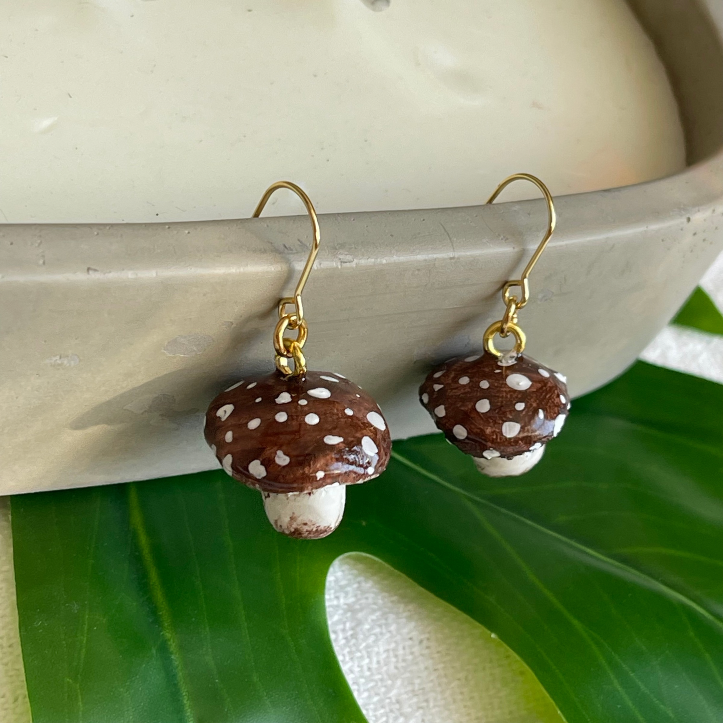 Handcrafted polymer clay earrings featuring intricate details, perfect for adding whimsical charm to any outfit. Lightweight and comfortable for all-day wear.