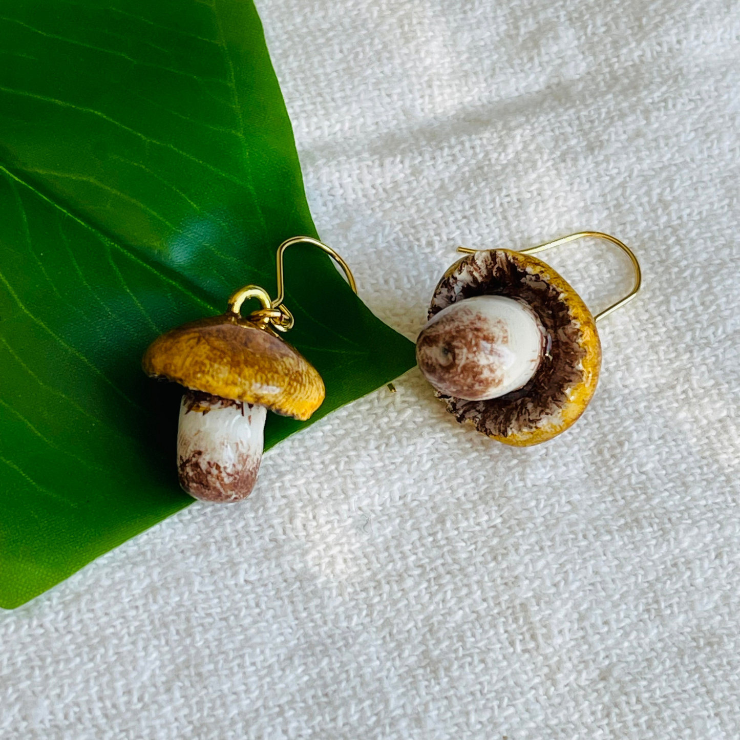 Handcrafted polymer clay earrings featuring intricate details, perfect for adding whimsical charm to any outfit. Lightweight and comfortable for all-day wear.