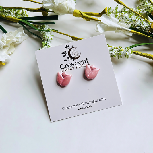 Handmade Pink Tulip Stud Earrings in lightweight polymer clay, perfect summer accessories that add charm and color to any outfit.