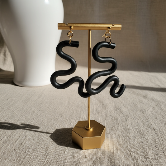 Handmade SELENE Swiggle Earrings crafted from polymer clay, featuring intricate artwork and modern geometric designs, lightweight and waterproof for a bold and unique accessory statement.