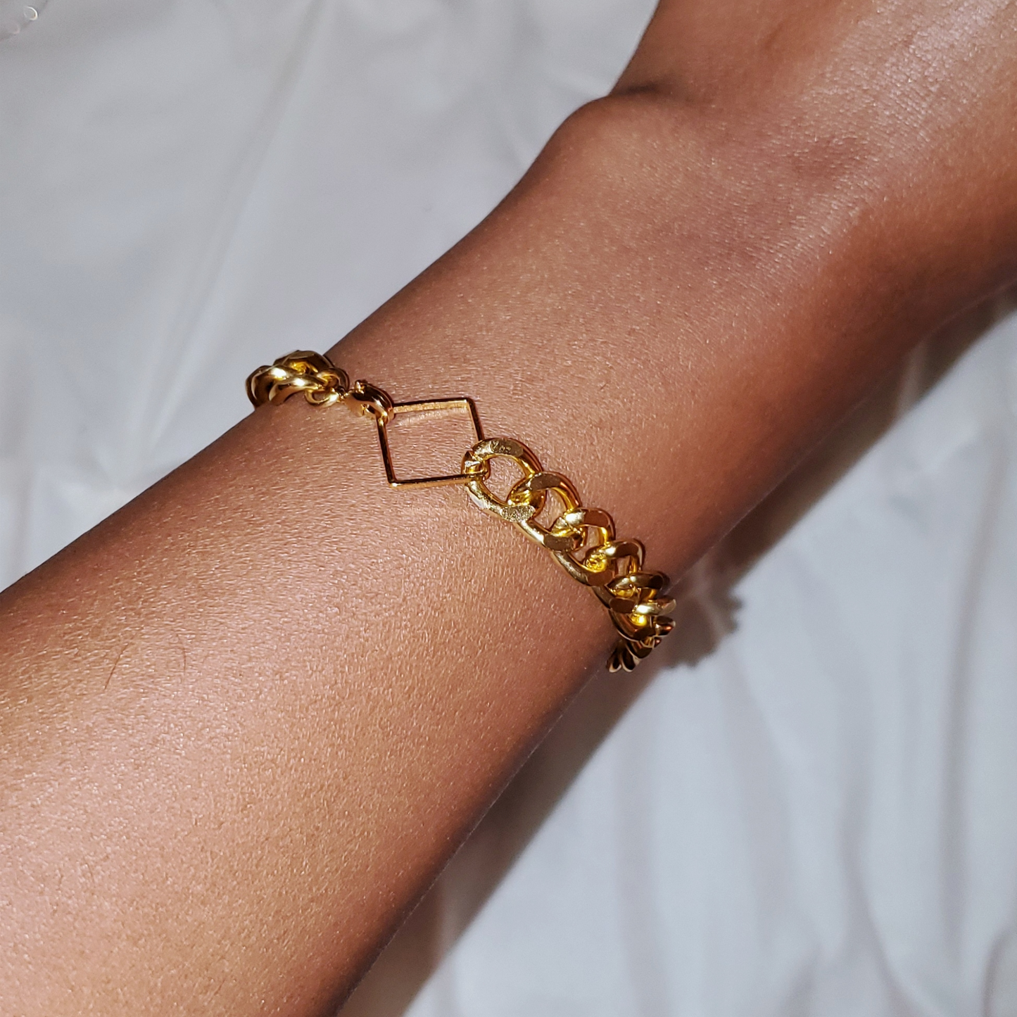 Curb Chain Bracelet - a perfect blend of simplicity, style, and boldness with a modern design. Lightweight and easy to wear, this bracelet is ideal for making a chic statement or creating a trendy stacked look. Handmade from lead and nickel-free, hypoallergenic materials, it features a sleek curb chain and luxurious gold-plated stainless steel for durability and timeless appeal. A thoughtful gift option that complements any outfit.