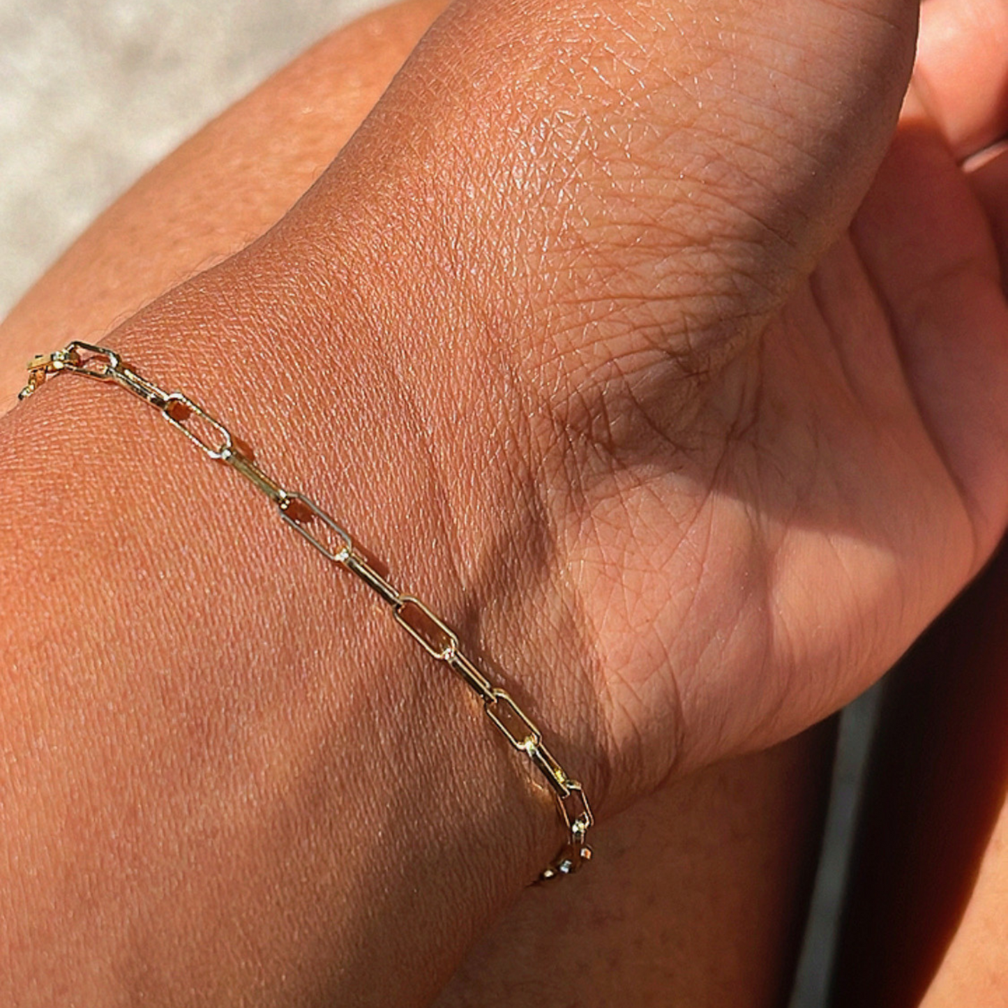 Minimalist 18k Gold Plated Bracelet - crafted from stainless steel, this sleek accessory enhances any outfit with sophistication. Lead and nickel-free, it's safe for sensitive skin. Lightweight and stackable, it offers versatile styling options. The adjustable design ensures a perfect fit for all wrist sizes, while its waterproof nature allows for worry-free wear in various settings. A timeless addition to any jewelry collection.