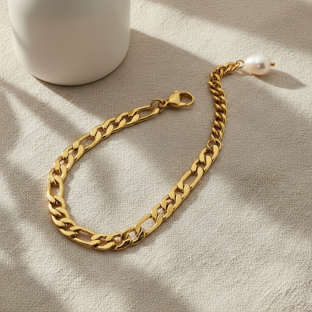 Exquisite 18k Gold Bracelet adorned with a single lustrous freshwater pearl, offering a blend of sophistication and elegance. Designed with hypoallergenic materials for skin comfort and featuring an adjustable fit, this bracelet is ideal for minimalist or layered styling, enhancing any outfit for everyday wear.