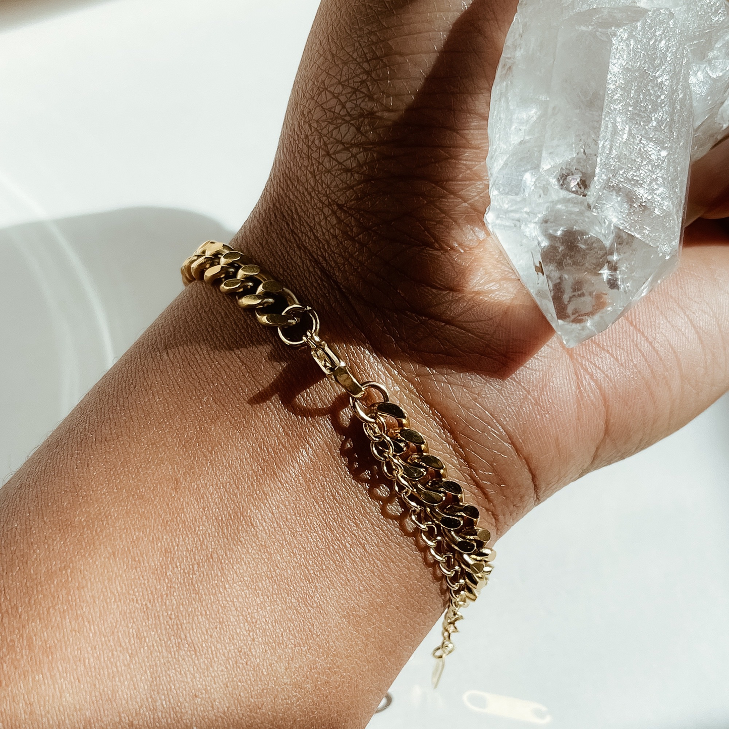 Julia Cuban Bracelet - a luxurious 18k gold-plated accessory featuring a sleek 6mm width. Designed with hypoallergenic and waterproof materials for lasting comfort, it offers an adjustable fit suitable for any wrist size. Perfect for adding a touch of elegance to both casual and formal outfits.