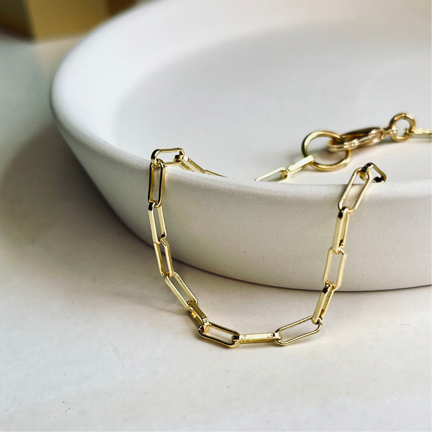 Minimalist 18k Gold Plated Bracelet - crafted from stainless steel, this sleek accessory enhances any outfit with sophistication. Lead and nickel-free, it's safe for sensitive skin. Lightweight and stackable, it offers versatile styling options. The adjustable design ensures a perfect fit for all wrist sizes, while its waterproof nature allows for worry-free wear in various settings. A timeless addition to any jewelry collection.