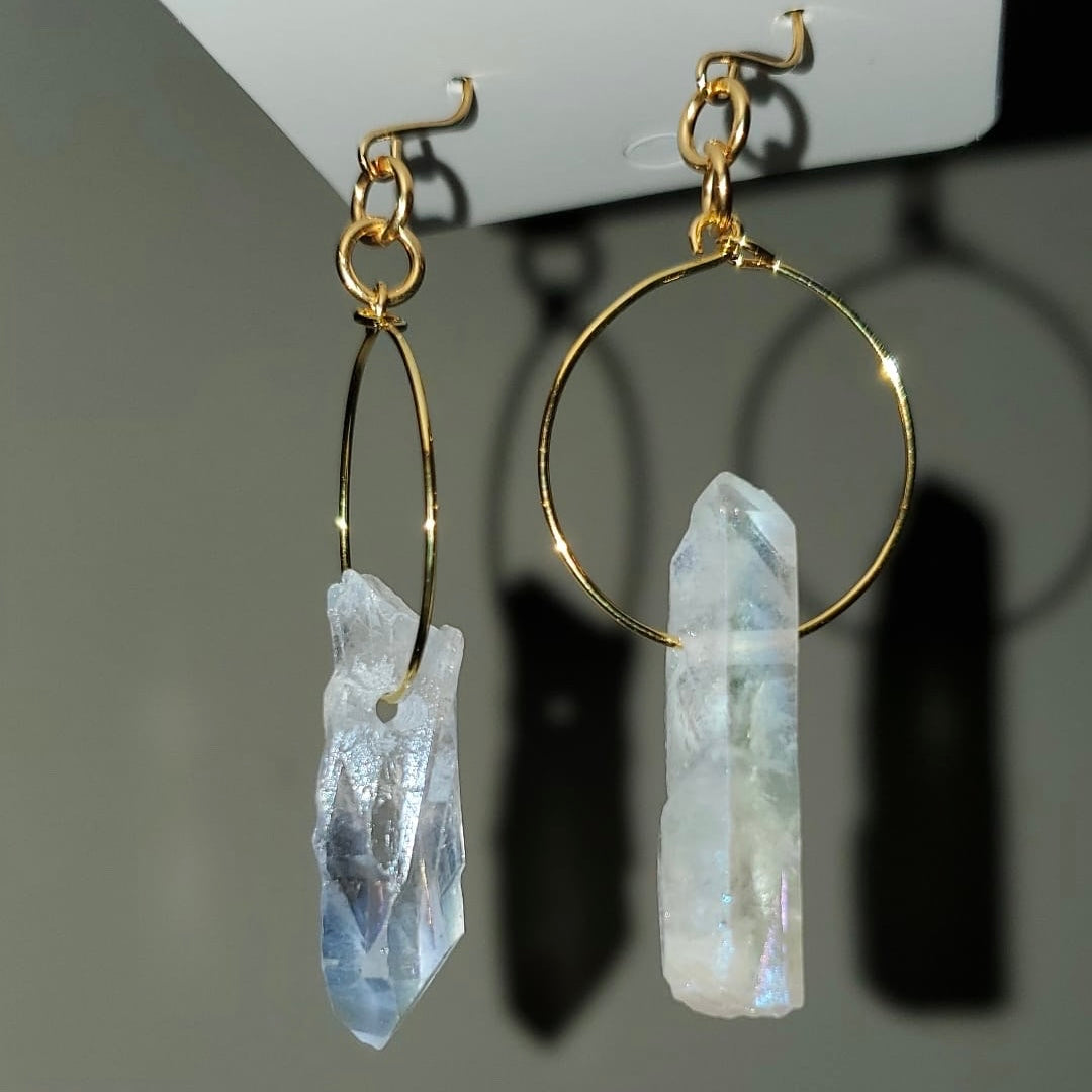 Close up of Quartz Hoop Earring - Stunning handcrafted earring with 18k gold-plated metal and raw quartz; lightweight and perfect for layering.